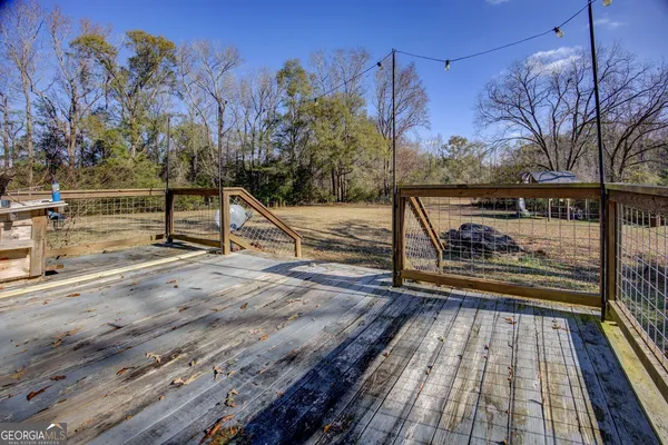 a view of backyard with green space
