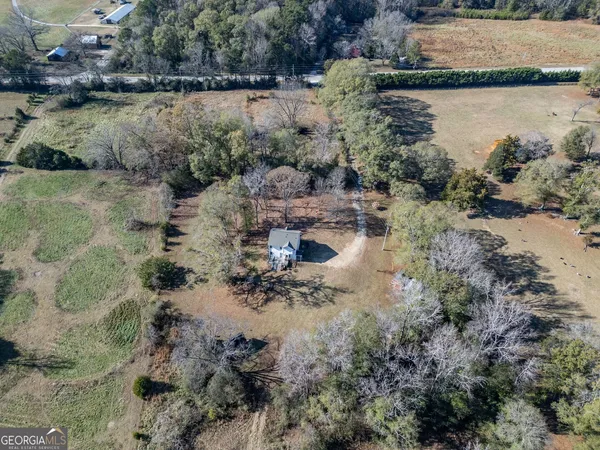 a view of lake with green space