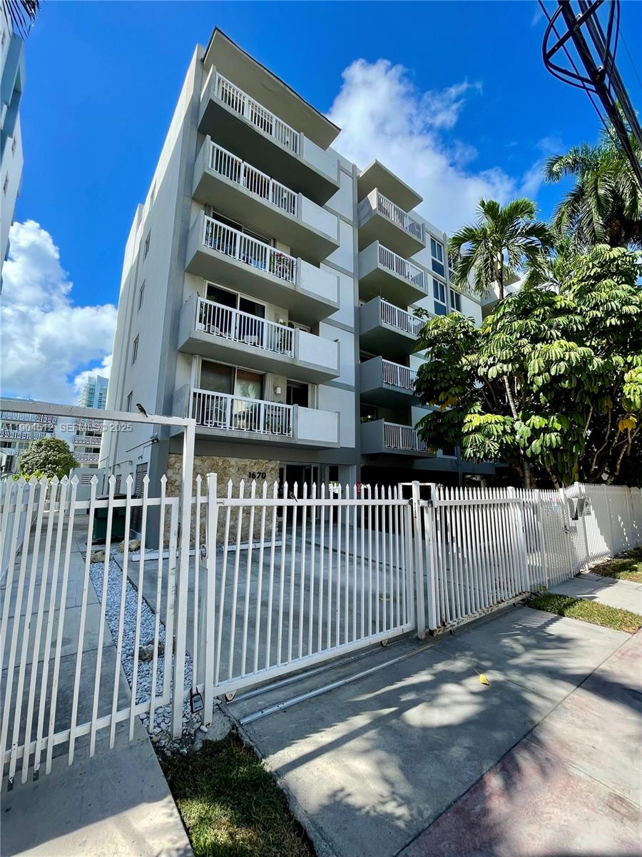 1670 Bay Road, Unit 2B Miami Beach, FL 33139 - Photo 1 of 15 a view of a large building