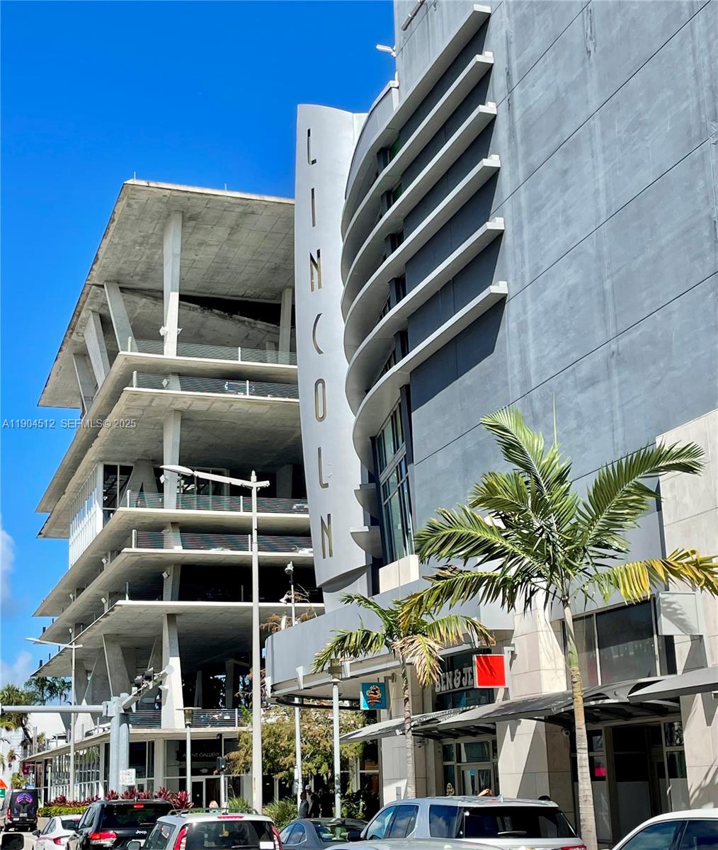 1670 Bay Road, Unit 2B Miami Beach, FL 33139 - Photo 15 of 15 a front view of multi story residential apartment building with yard