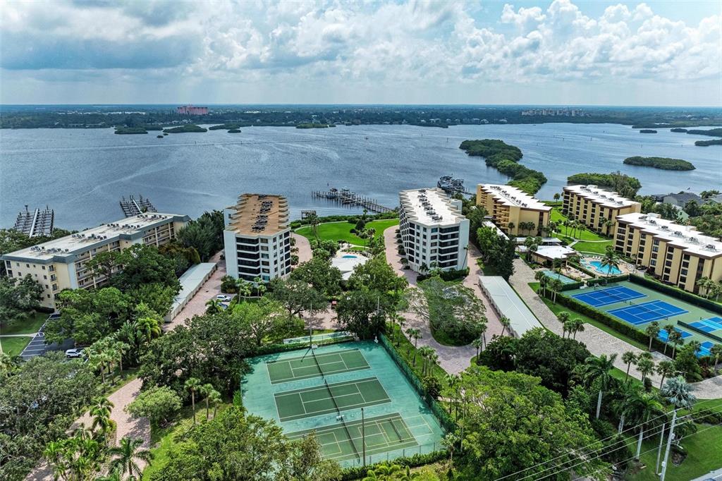 8735 Midnight Pass Road, Unit 107B Sarasota, FL 34242 - Photo 51 of 55 a view of a garden