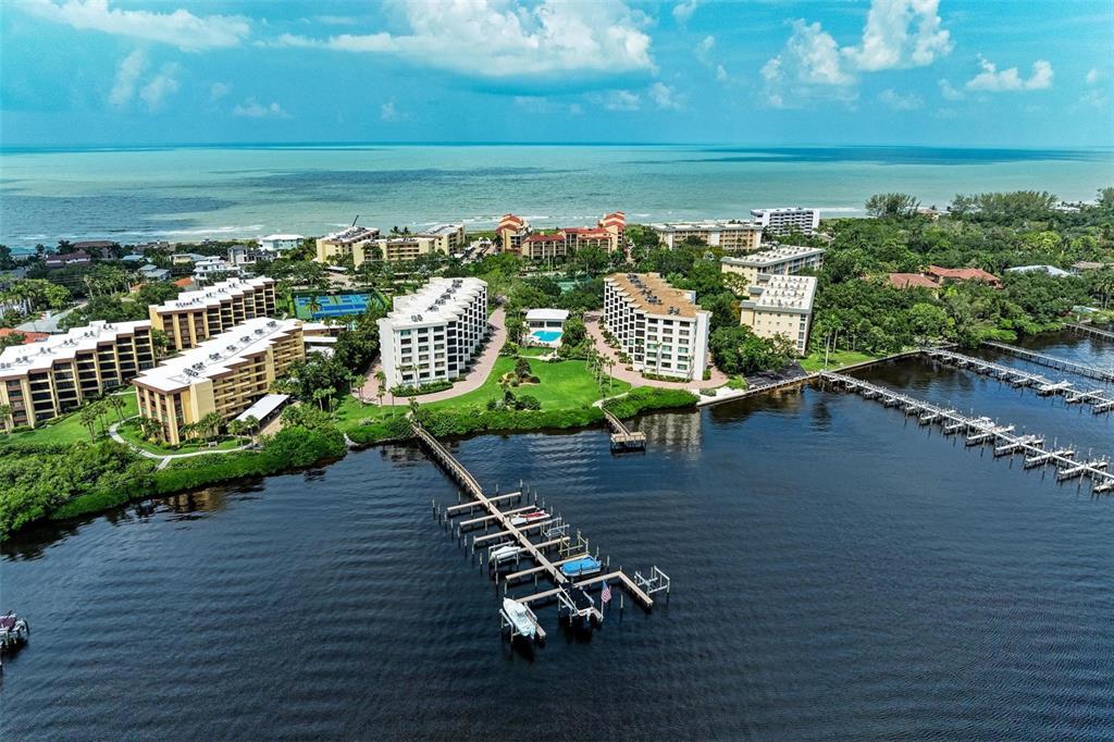 8735 Midnight Pass Road, Unit 107B Sarasota, FL 34242 - Photo 52 of 55 a view of a balcony with an ocean view
