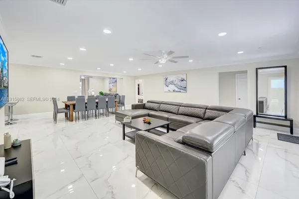 a living room with furniture and a table