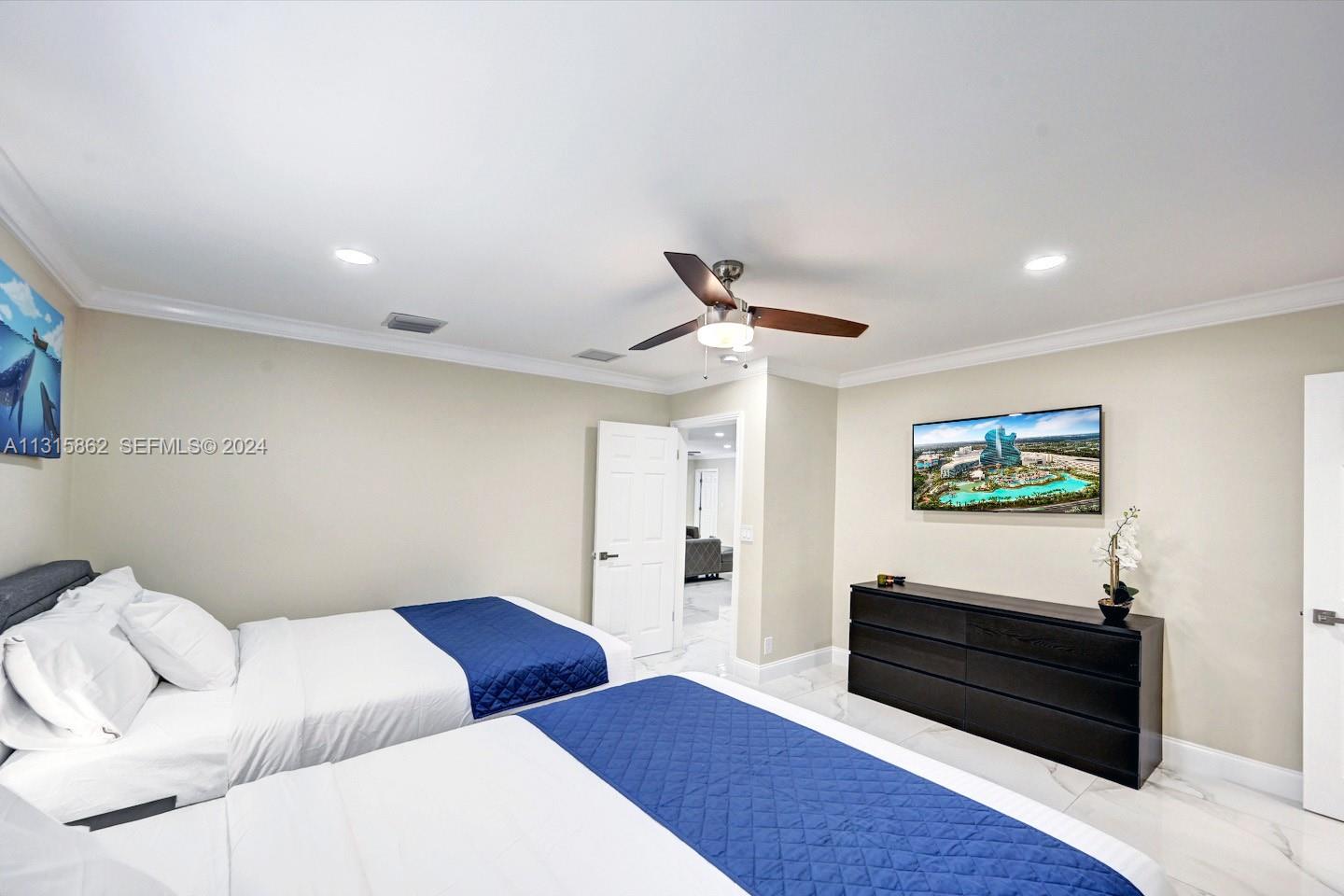 1307 Rodman Street Hollywood, FL 33019 - Photo 14 of 38 a living room with furniture and a rug