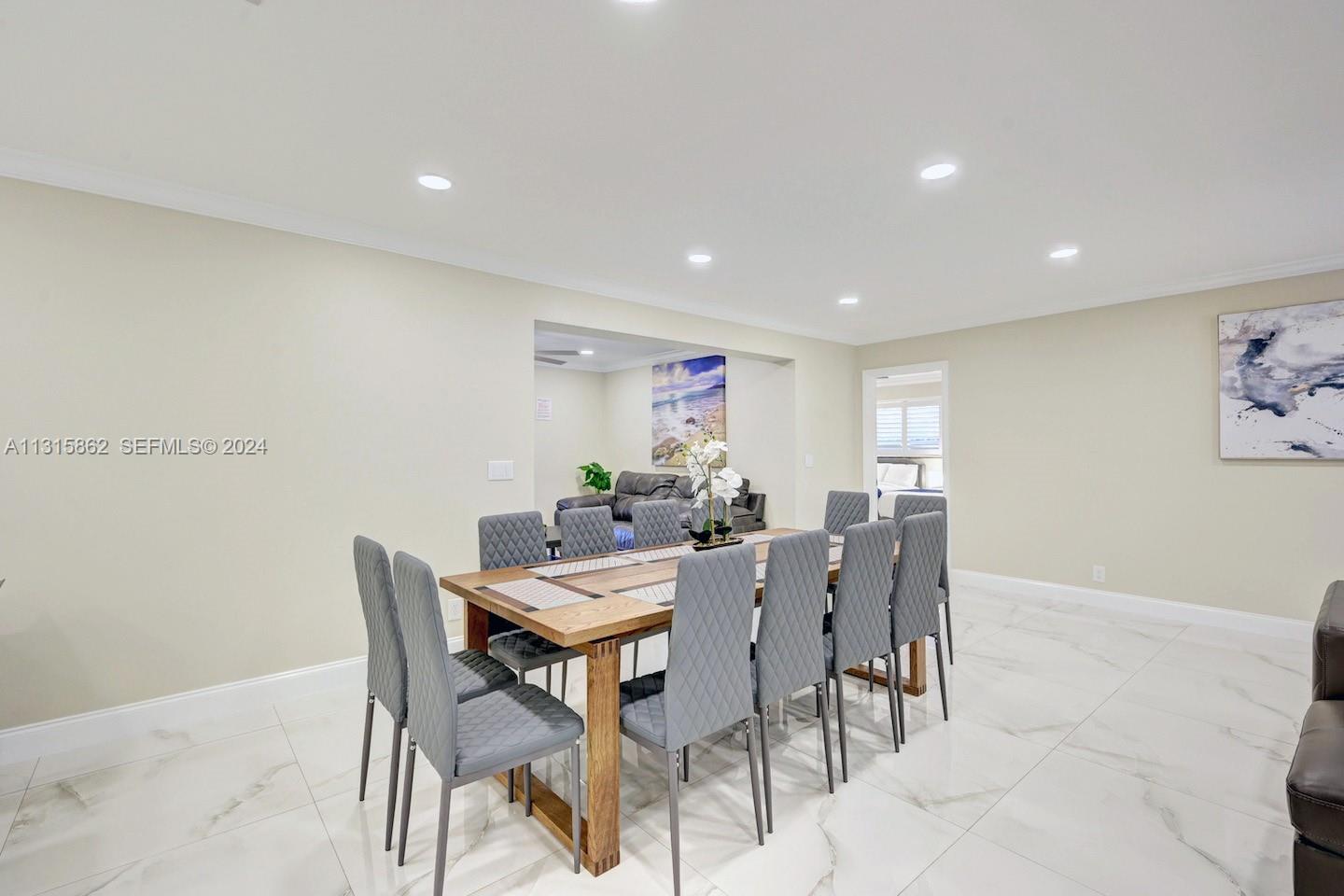 1307 Rodman Street Hollywood, FL 33019 - Photo 23 of 38 a view of a dining room with furniture