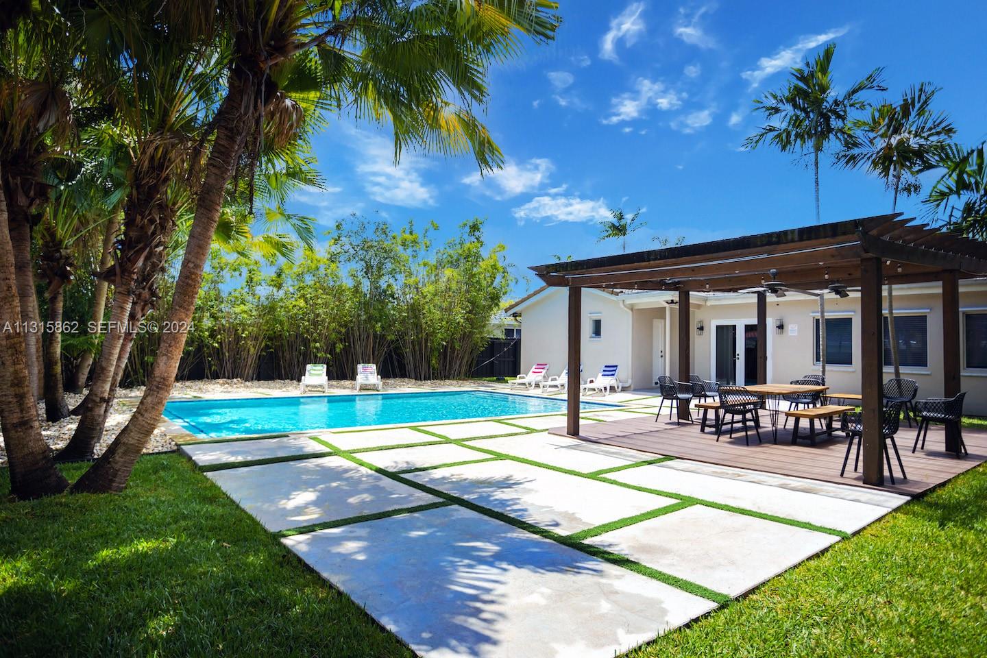 1307 Rodman Street Hollywood, FL 33019 - Photo 3 of 38 a house view with outdoor seating space