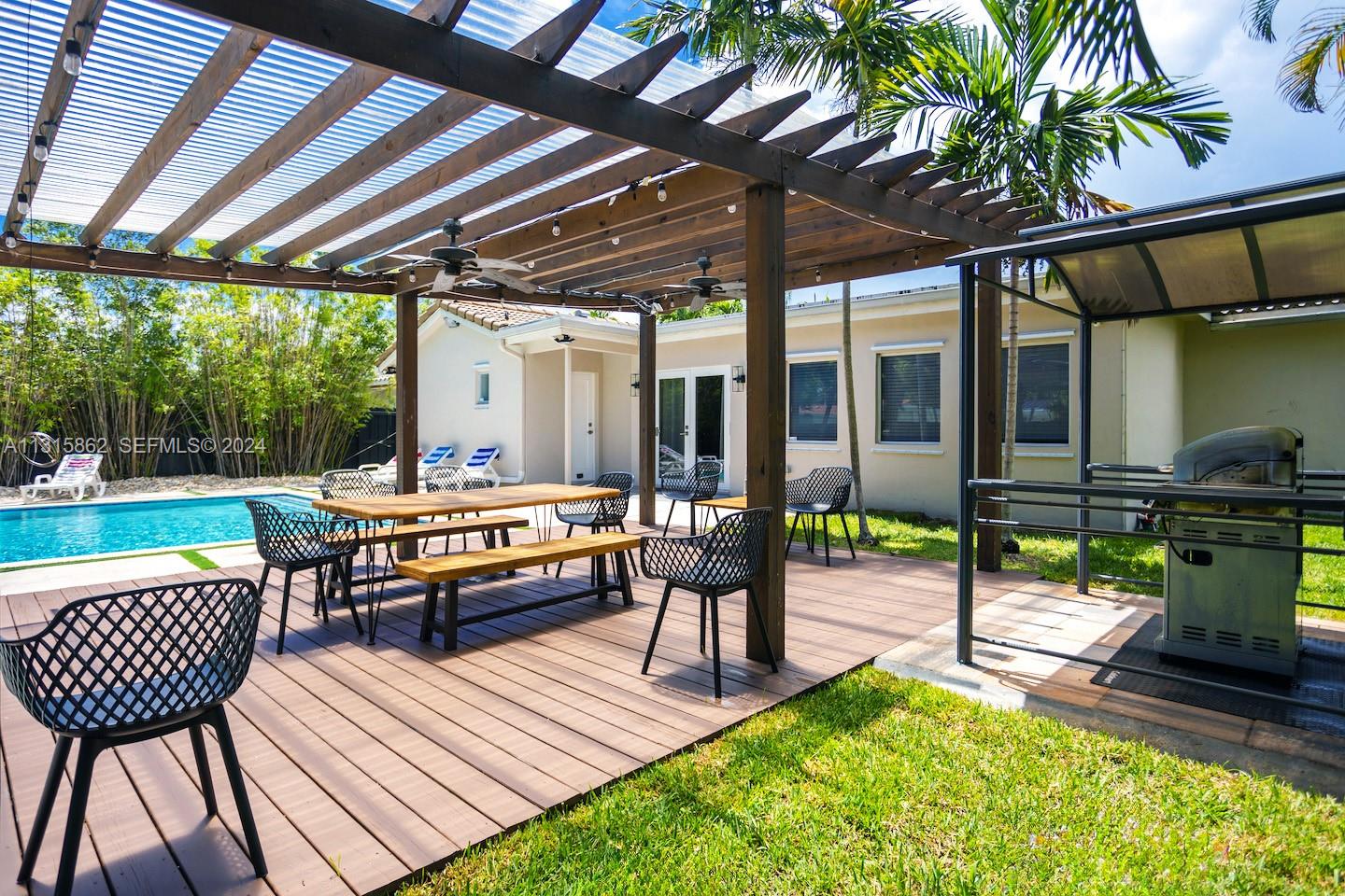 1307 Rodman Street Hollywood, FL 33019 - Photo 4 of 38 a patio view with a seating space