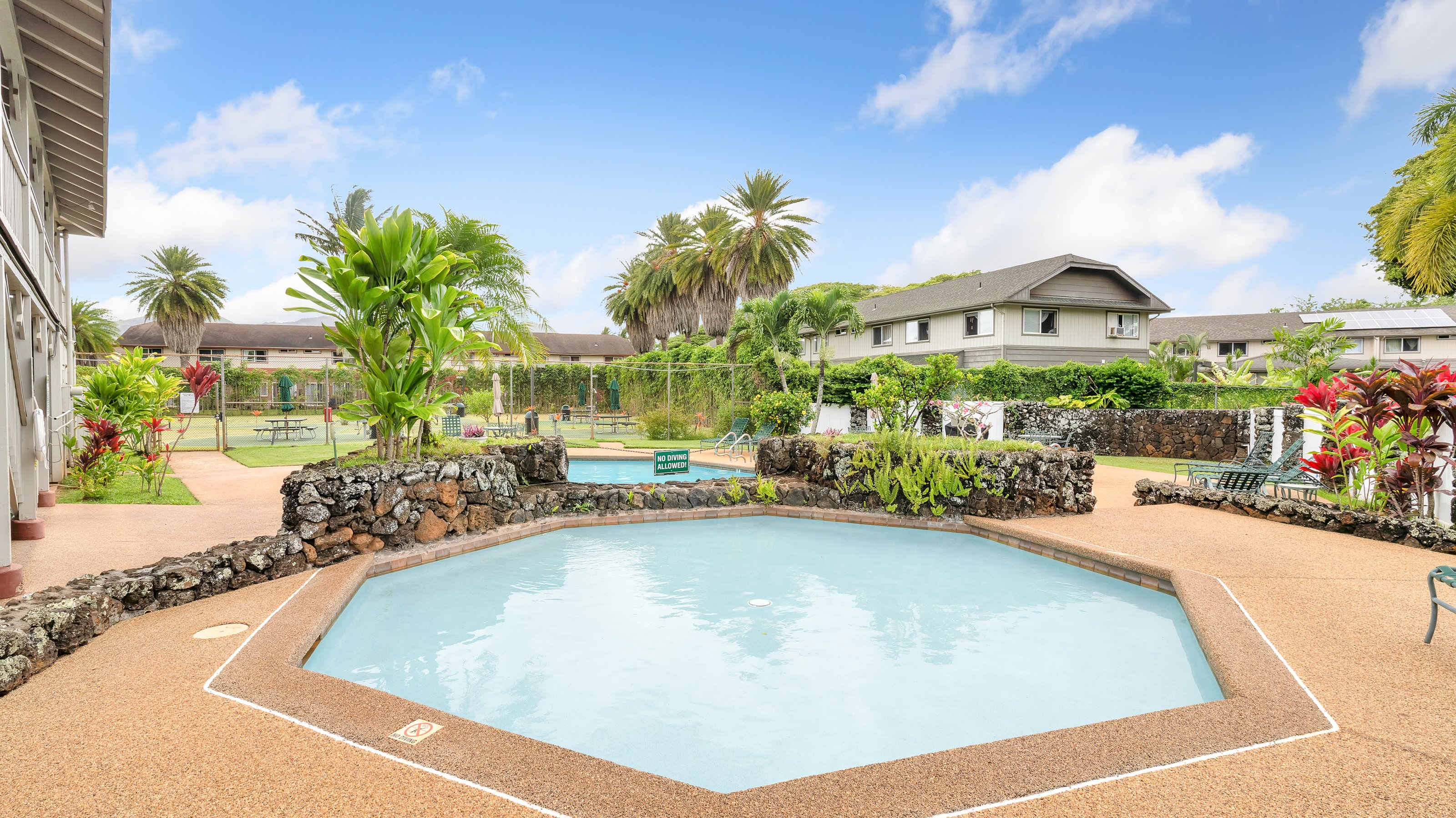 4121 Rice Street, Unit 2708 Lihue, HI 96766 - Photo 24 of 29 a view of a swimming pool with a patio