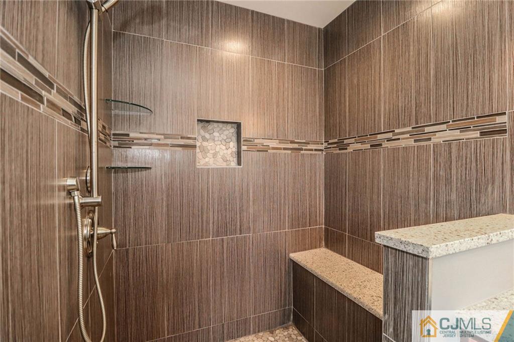 23 Windsor Road Edison, NJ 08817 - Photo 17 of 25 a bathroom with a shower and a sink