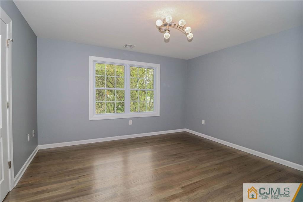 23 Windsor Road Edison, NJ 08817 - Photo 21 of 25 a view of livingroom with hardwood