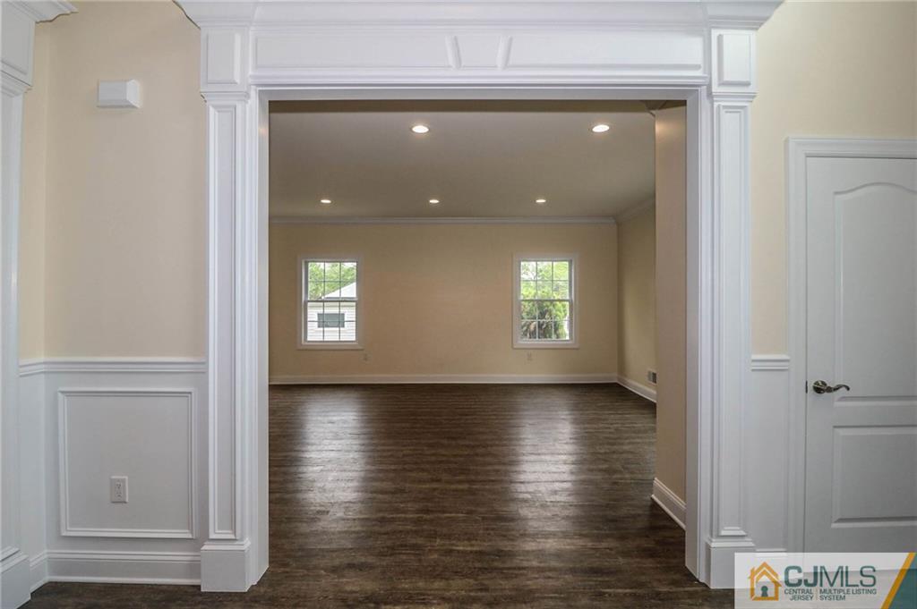 23 Windsor Road Edison, NJ 08817 - Photo 8 of 25 a view of an empty room and window