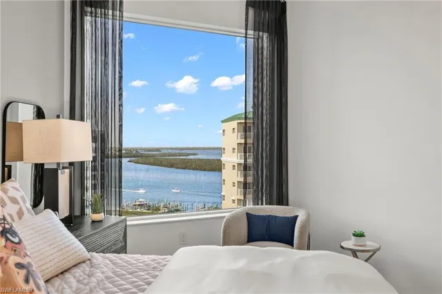 a bathroom with a double vanity sink toilet and shower