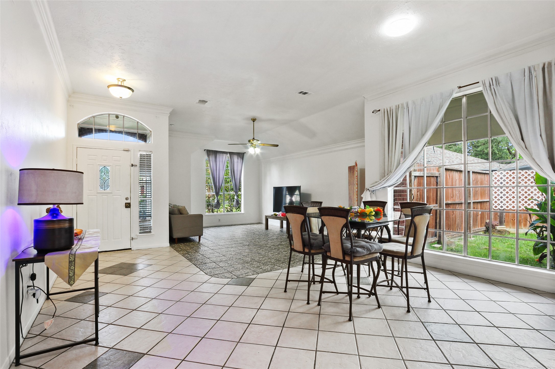14554 Sycamore Lake Road Houston, TX 77062 - Photo 5 of 17 a view of a dining room with furniture window and outside view