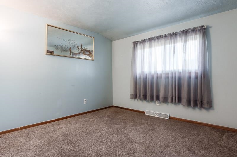 20110 Grade School Road Caledonia, IL 61011 - Photo 18 of 39 an empty room with window
