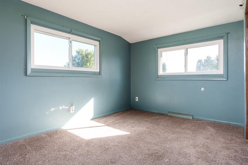 20110 Grade School Road Caledonia, IL 61011 - Photo 21 of 39 an empty room with a window
