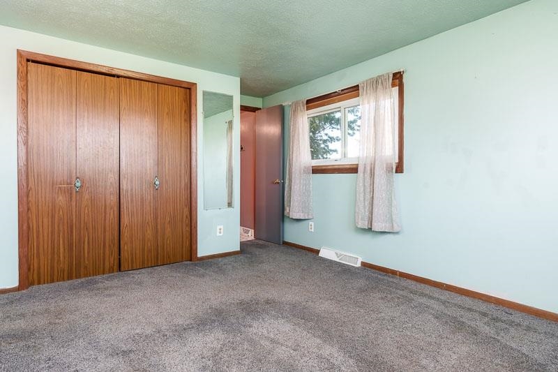 20110 Grade School Road Caledonia, IL 61011 - Photo 25 of 39 an empty room with windows