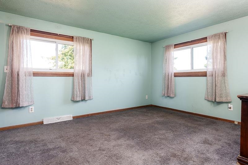 20110 Grade School Road Caledonia, IL 61011 - Photo 26 of 39 an empty room with windows