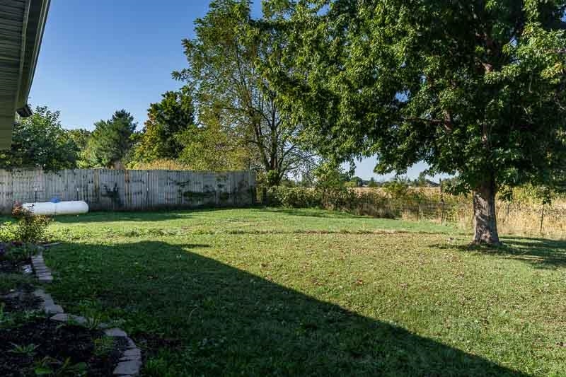20110 Grade School Road Caledonia, IL 61011 - Photo 38 of 39 a view of a backyard