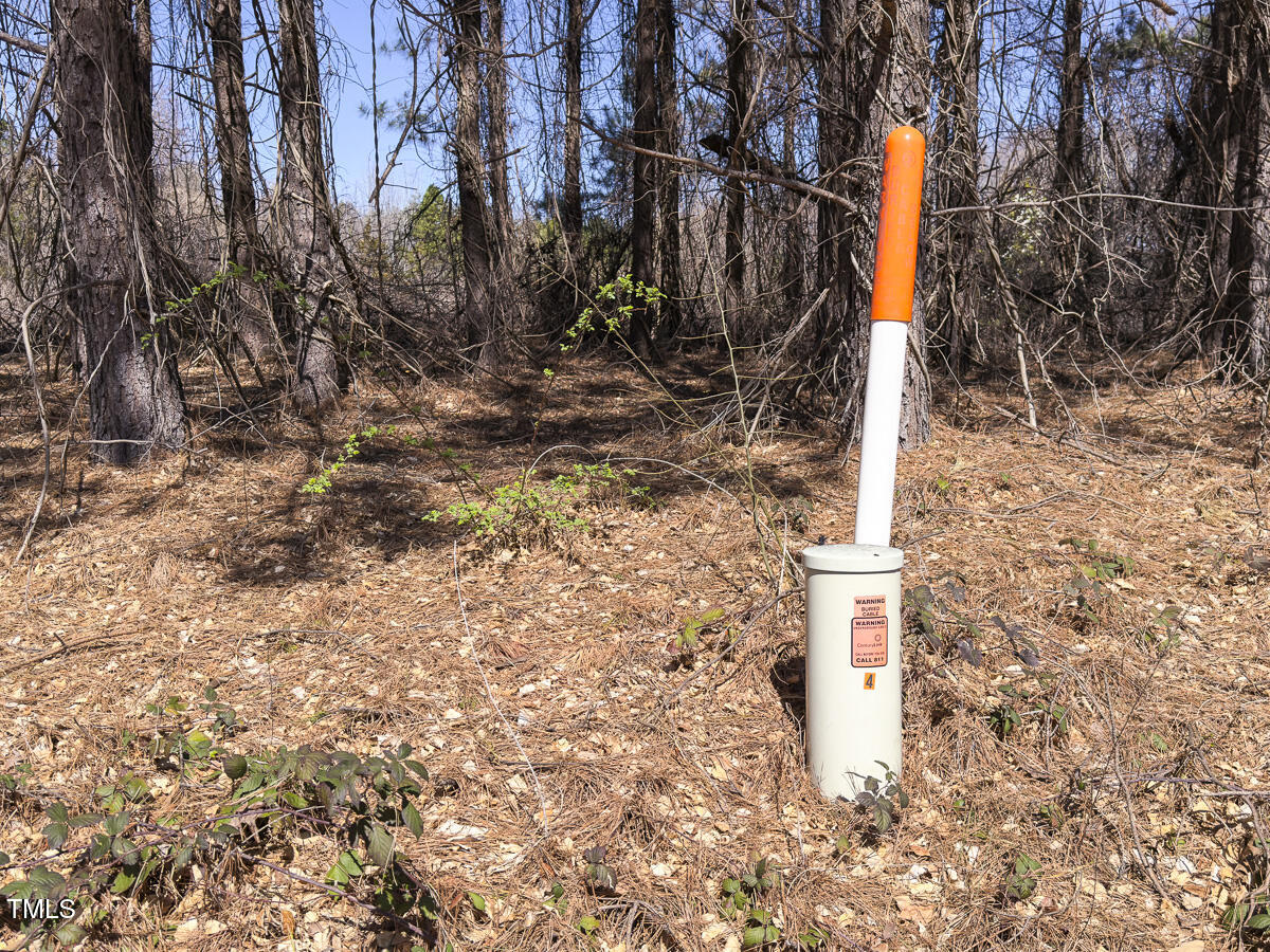 Lot 6 Goodman Road Pelham, NC 27311 - Photo 27 of 42 a sign board with wooden fence