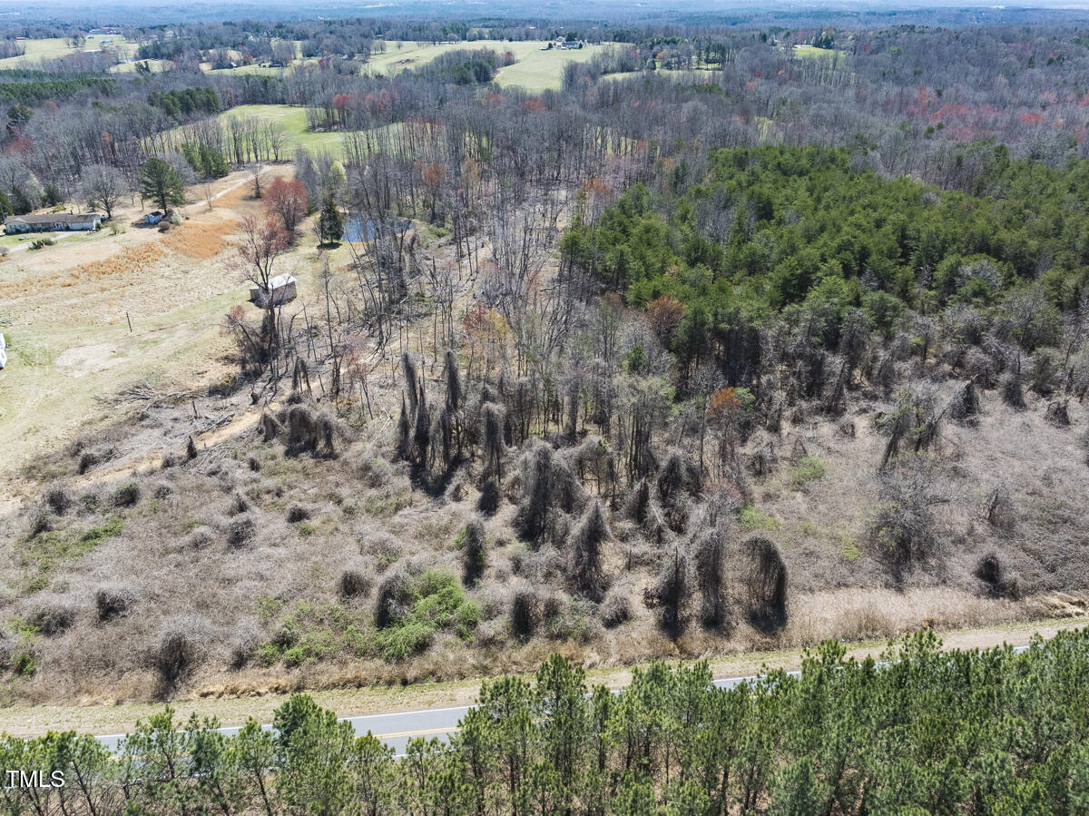 Lot 6 Goodman Road Pelham, NC 27311 - Photo 31 of 42 a view of a houses with yard