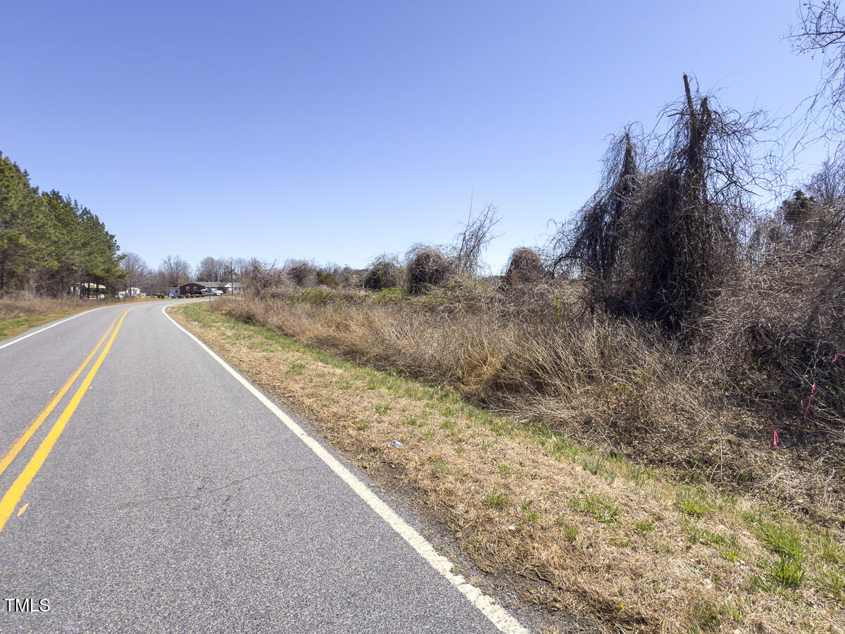 Lot 6 Goodman Road Pelham, NC 27311 - Photo 34 of 42 a view of a dry yard with wooden fence
