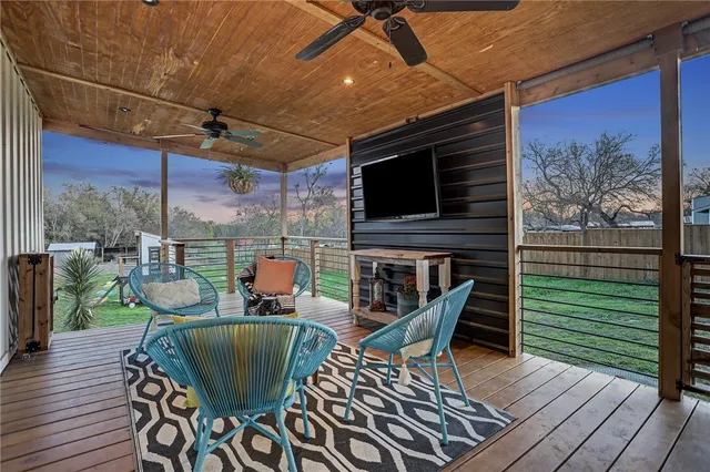 a dining room with furniture and a fireplace