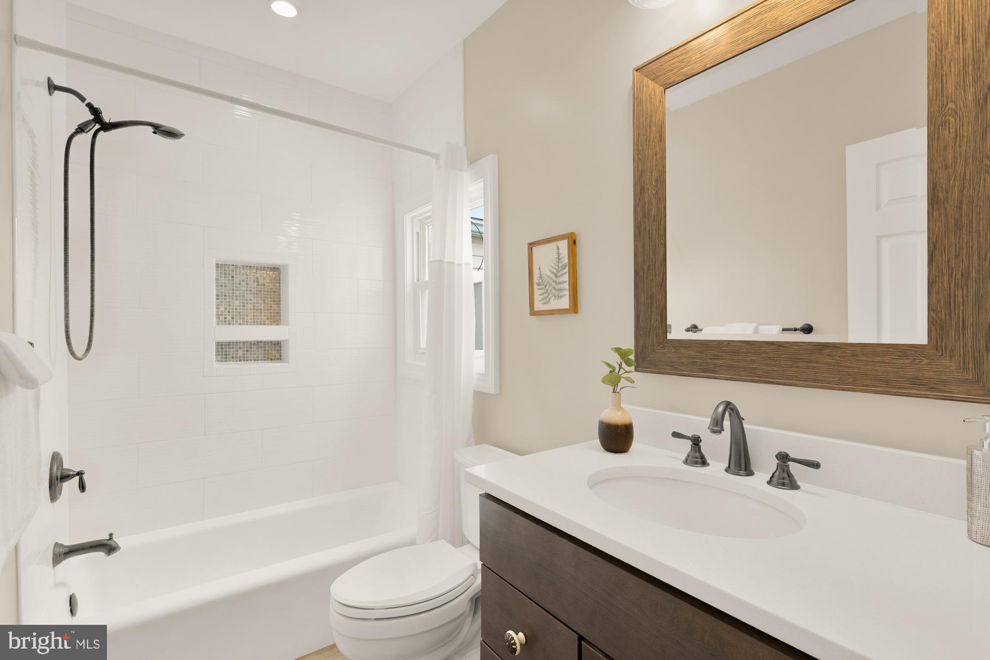 1112 Park Street Northeast Washington, DC 20002 - Photo 21 of 23 a bathroom with a sink a toilet and shower