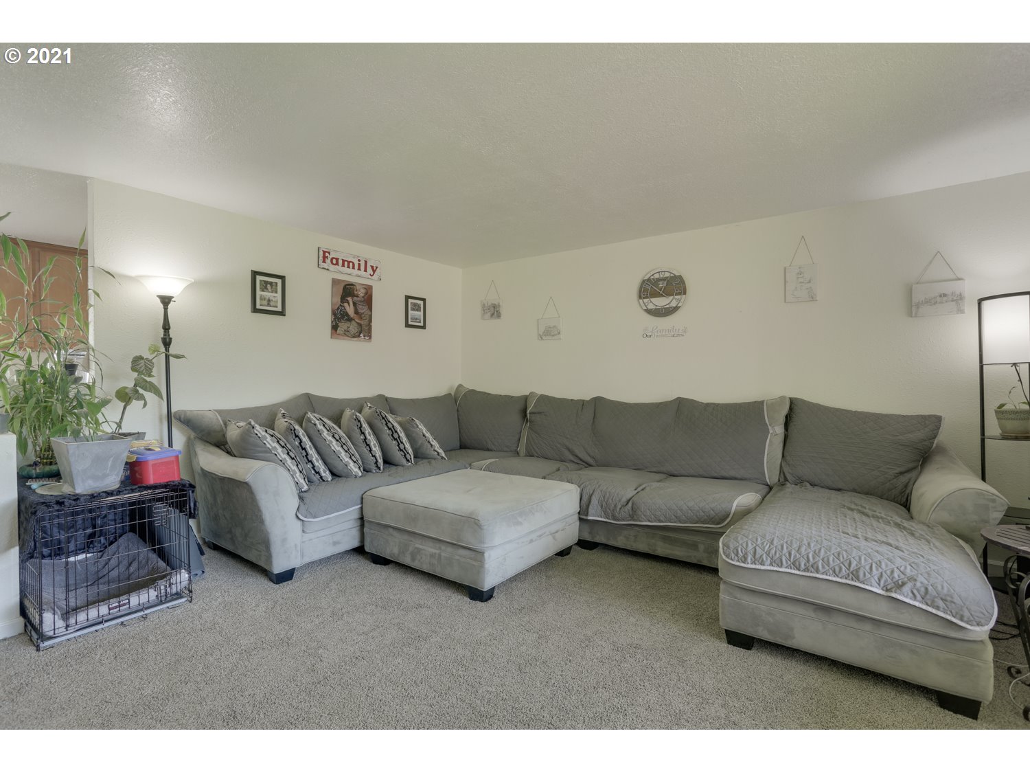 26440 Northwest Reeder Road Portland, OR 97231 - Photo 3 of 31 a living room with furniture and a couch