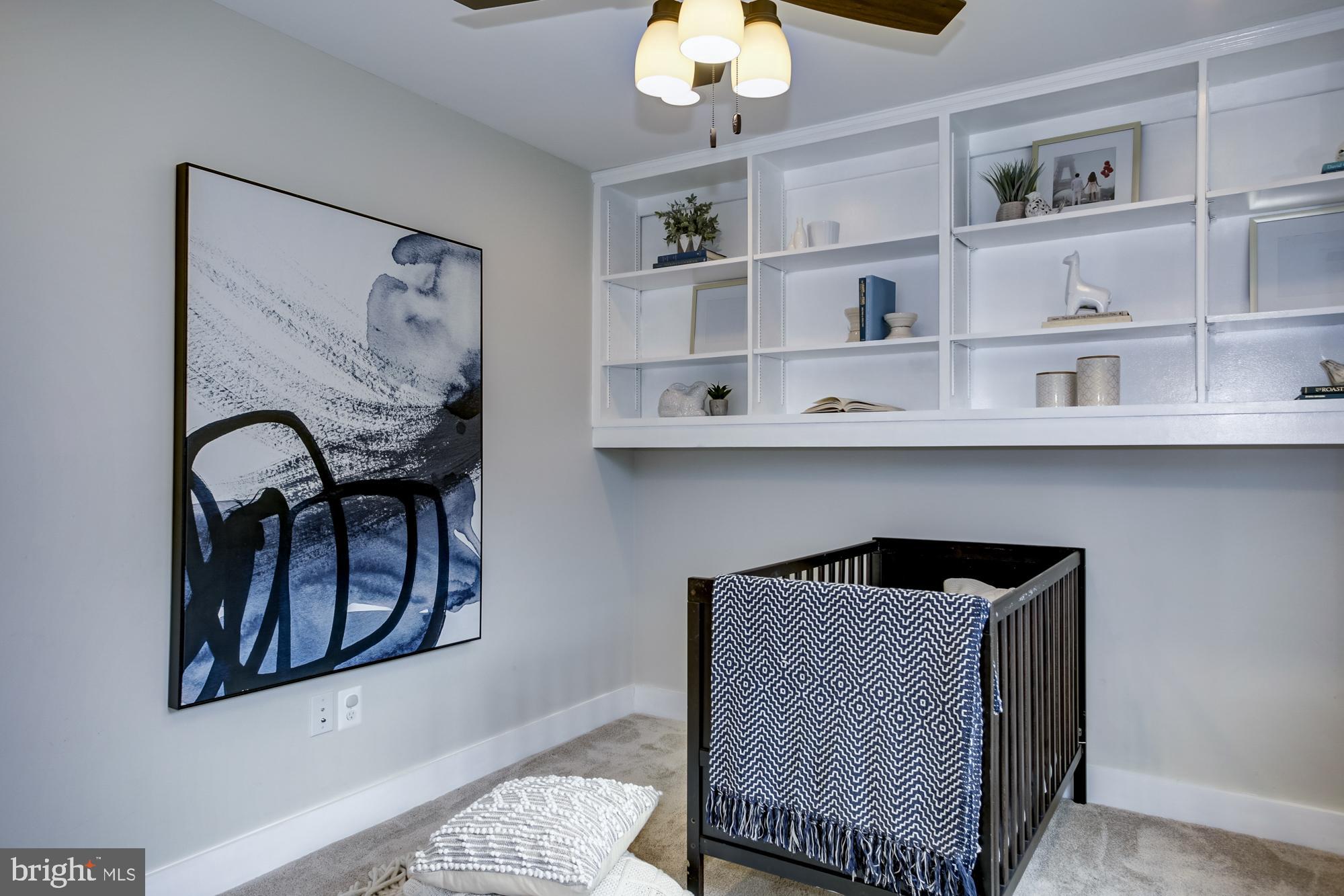 5507 Durbin Road Bethesda, MD 20814 - Photo 25 of 50 BR3 enjoy built-in shelving and ceiling fan