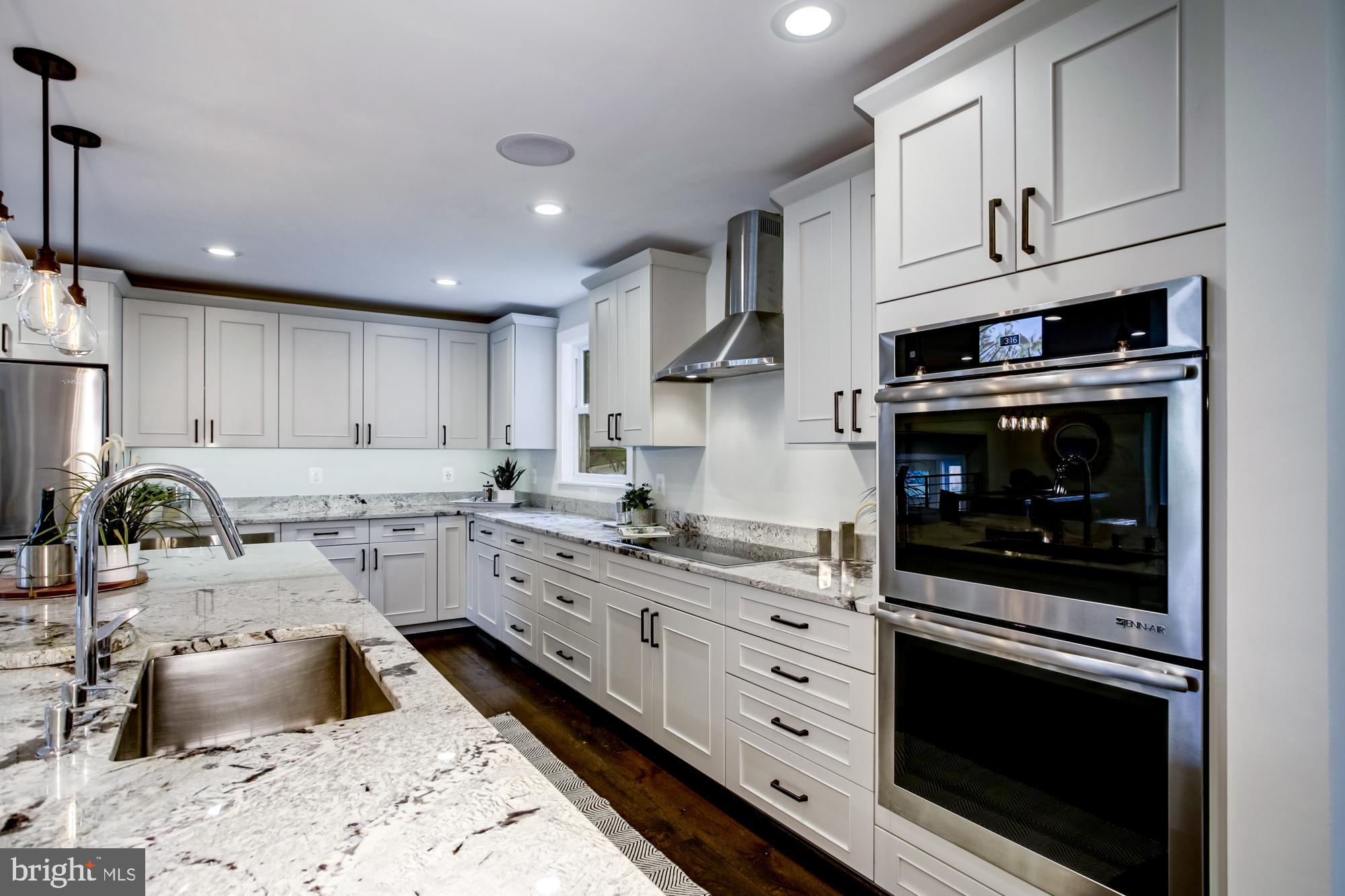 5507 Durbin Road Bethesda, MD 20814 - Photo 9 of 50 Induction cooktop and double wall oven