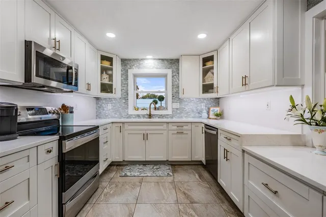 a bathroom with a sink a toilet and a bathtub