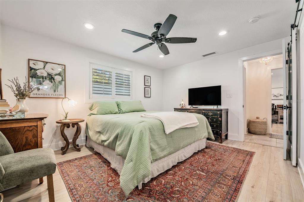 2020 Culberson Avenue Dunedin, FL 34698 - Photo 17 of 52 a bed room with a bed and a television