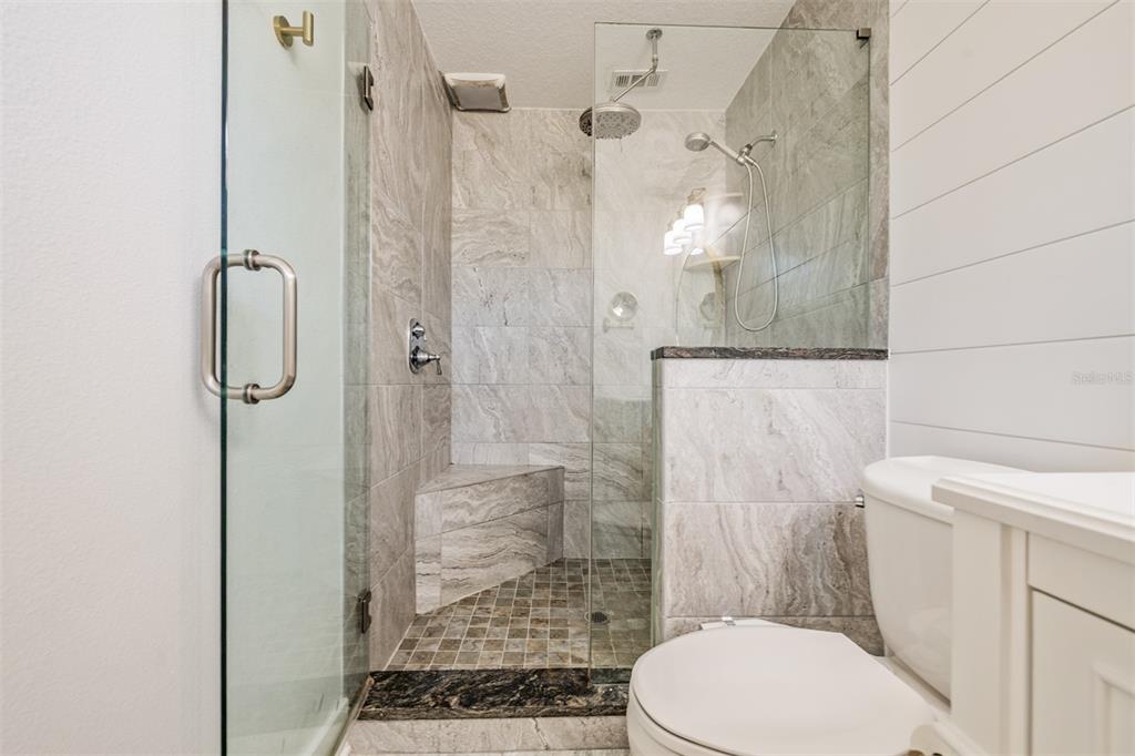 2020 Culberson Avenue Dunedin, FL 34698 - Photo 19 of 52 a bathroom with a toilet and shower