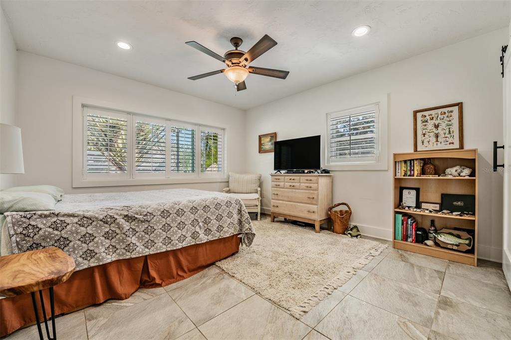 2020 Culberson Avenue Dunedin, FL 34698 - Photo 22 of 52 a living room with furniture and a flat screen tv