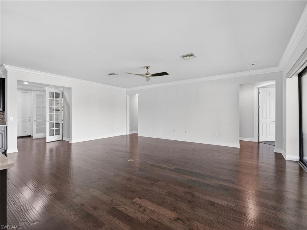 6124 Victory Drive Ave Maria, FL 34142 - Photo 18 of 50 a view of a livingroom with wooden floor
