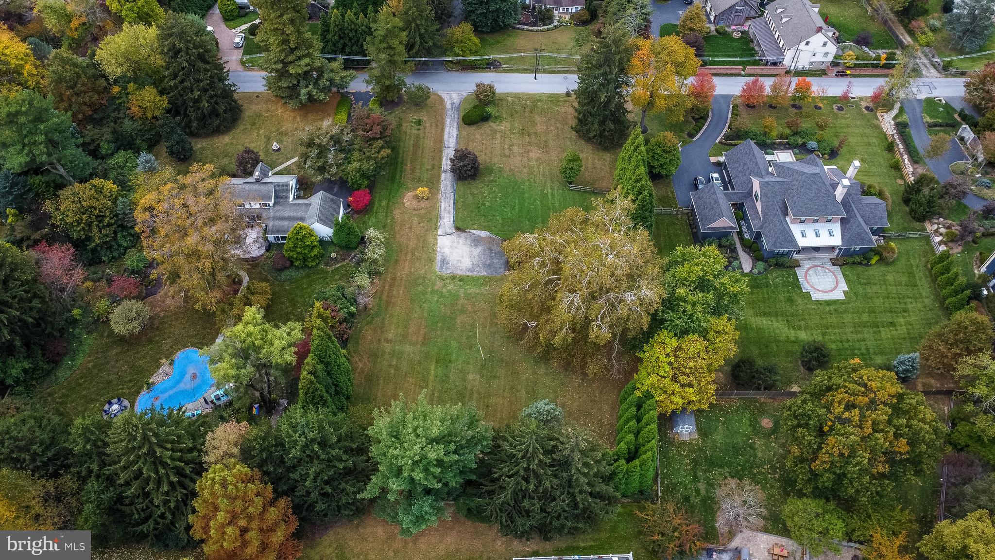 356 King Of Prussia Road Wayne, PA 19087 - Photo 6 of 8 an aerial view of house with yard swimming pool and outdoor seating
