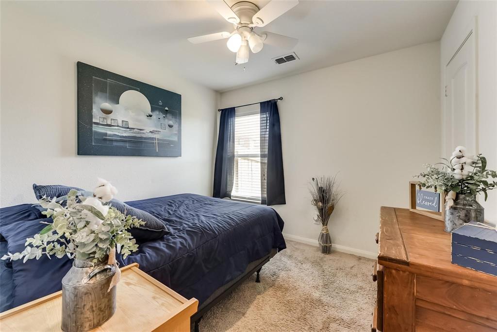 1300 Clegg Street Howe, TX 75459 - Photo 10 of 14 Bedroom featuring neutral wall paint, carpet flooring, a window with blinds and dark curtains, and a ceiling fan with integrated lighting