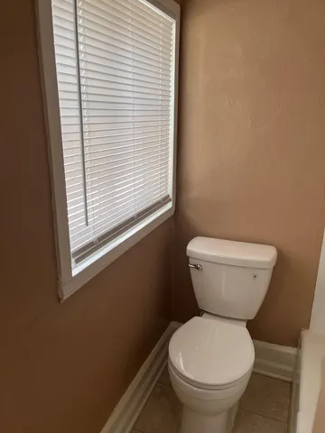 a small bathroom with a toilet