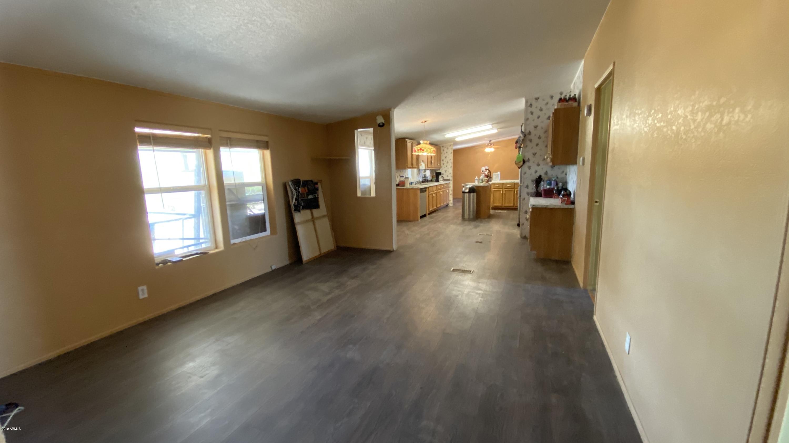 17494 North Stonebluff Road Maricopa, AZ 85139 - Photo 11 of 42 10_Kitchen and 2nd Dining