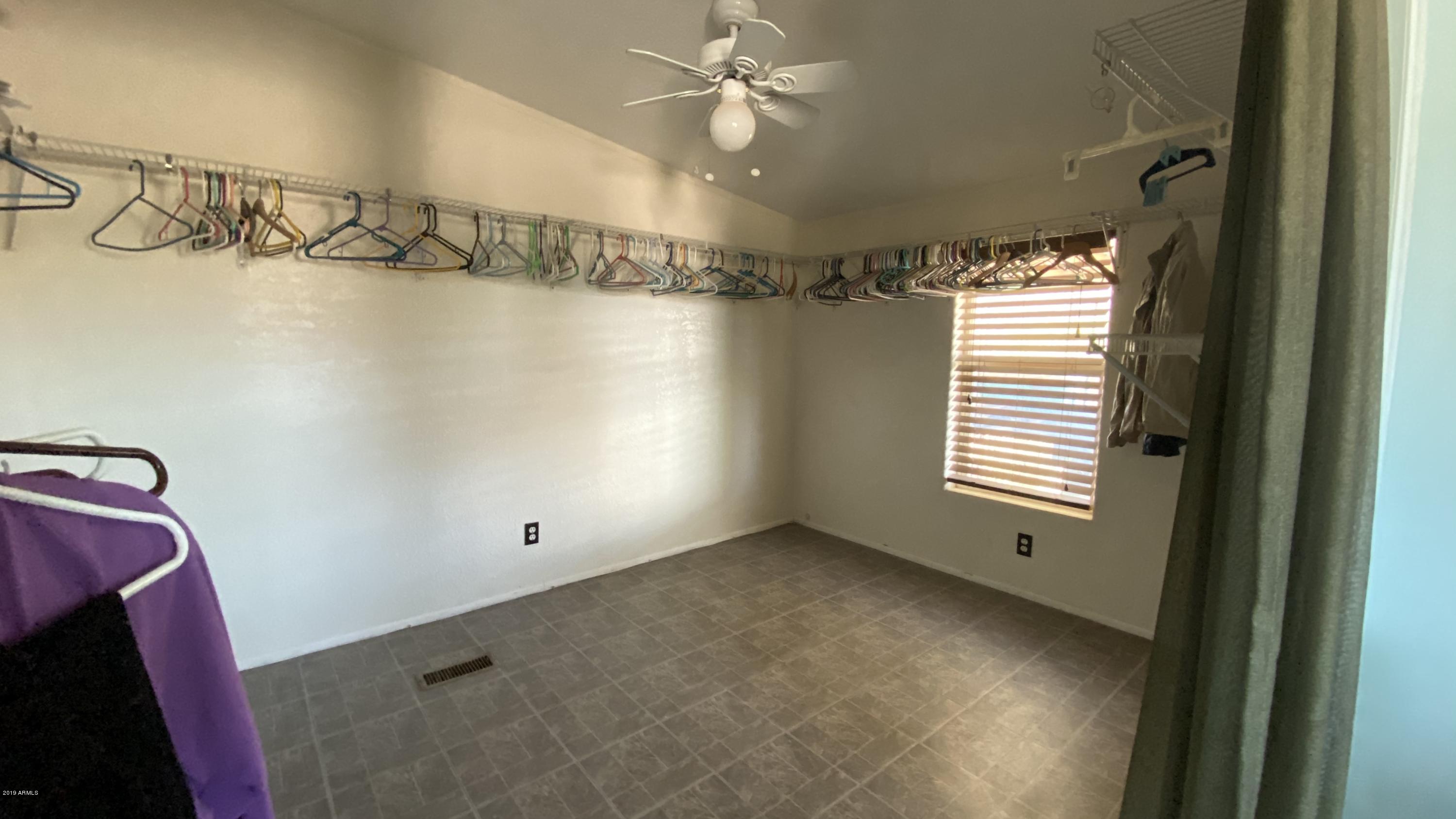 17494 North Stonebluff Road Maricopa, AZ 85139 - Photo 13 of 42 12_Master Closet or Sitting Area