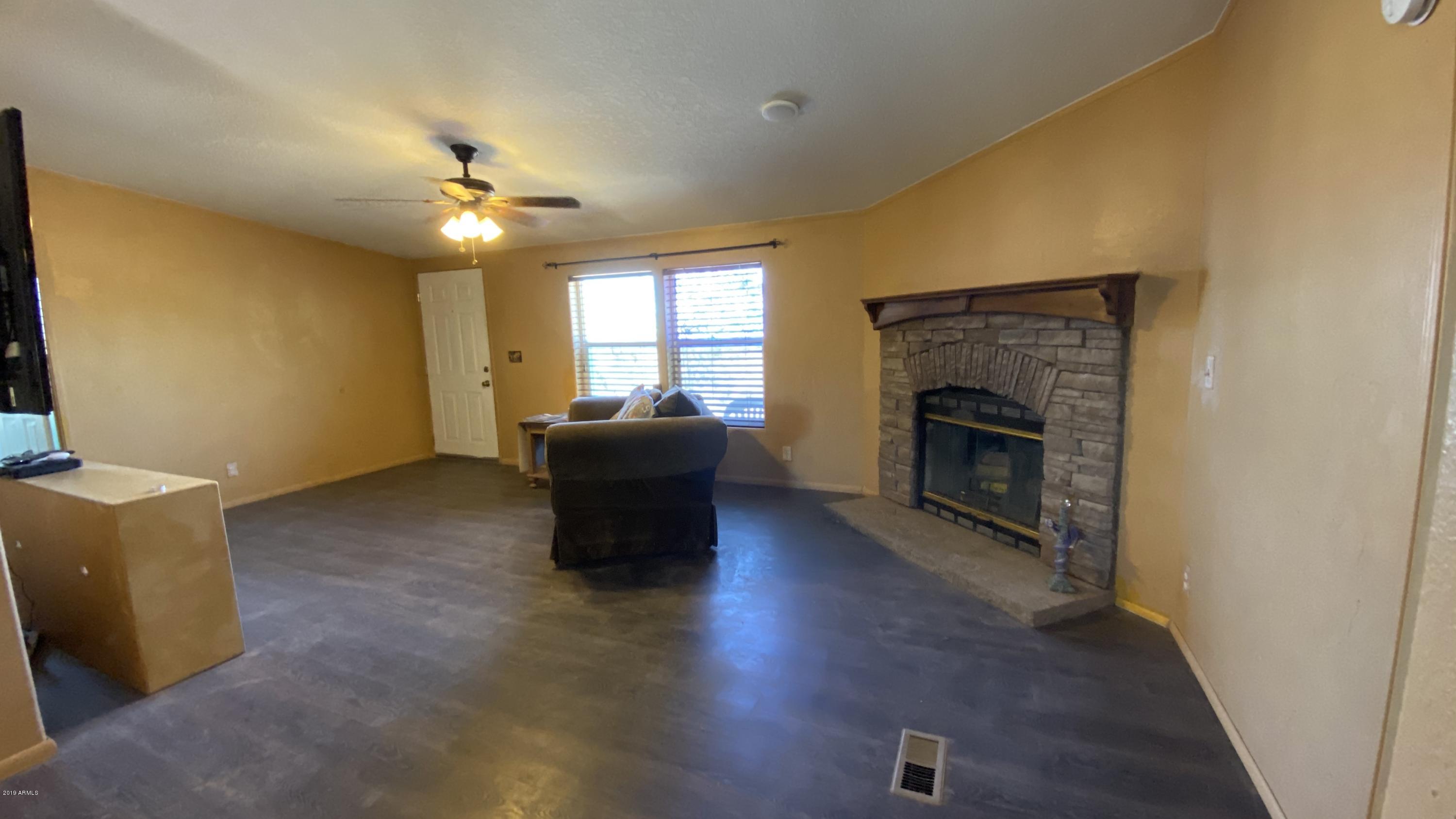17494 North Stonebluff Road Maricopa, AZ 85139 - Photo 4 of 42 4_Living Room
