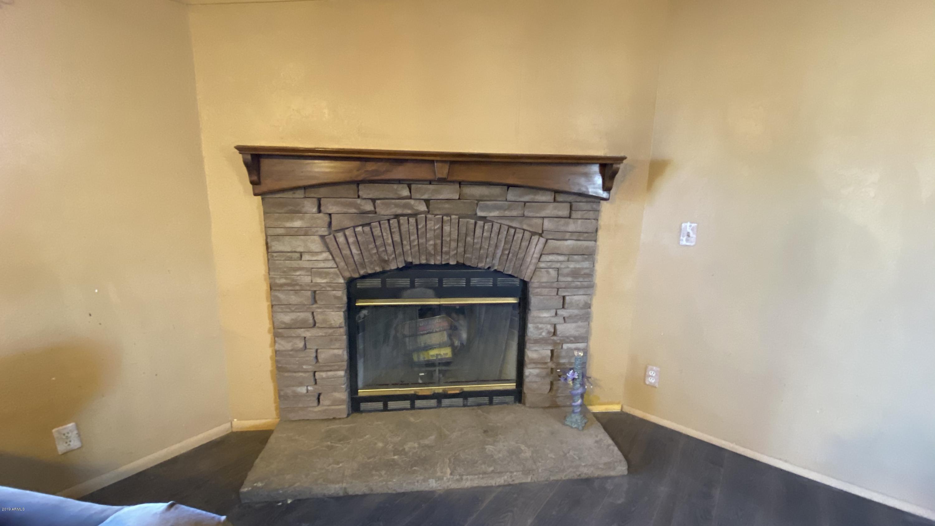 17494 North Stonebluff Road Maricopa, AZ 85139 - Photo 5 of 42 5_Fireplace