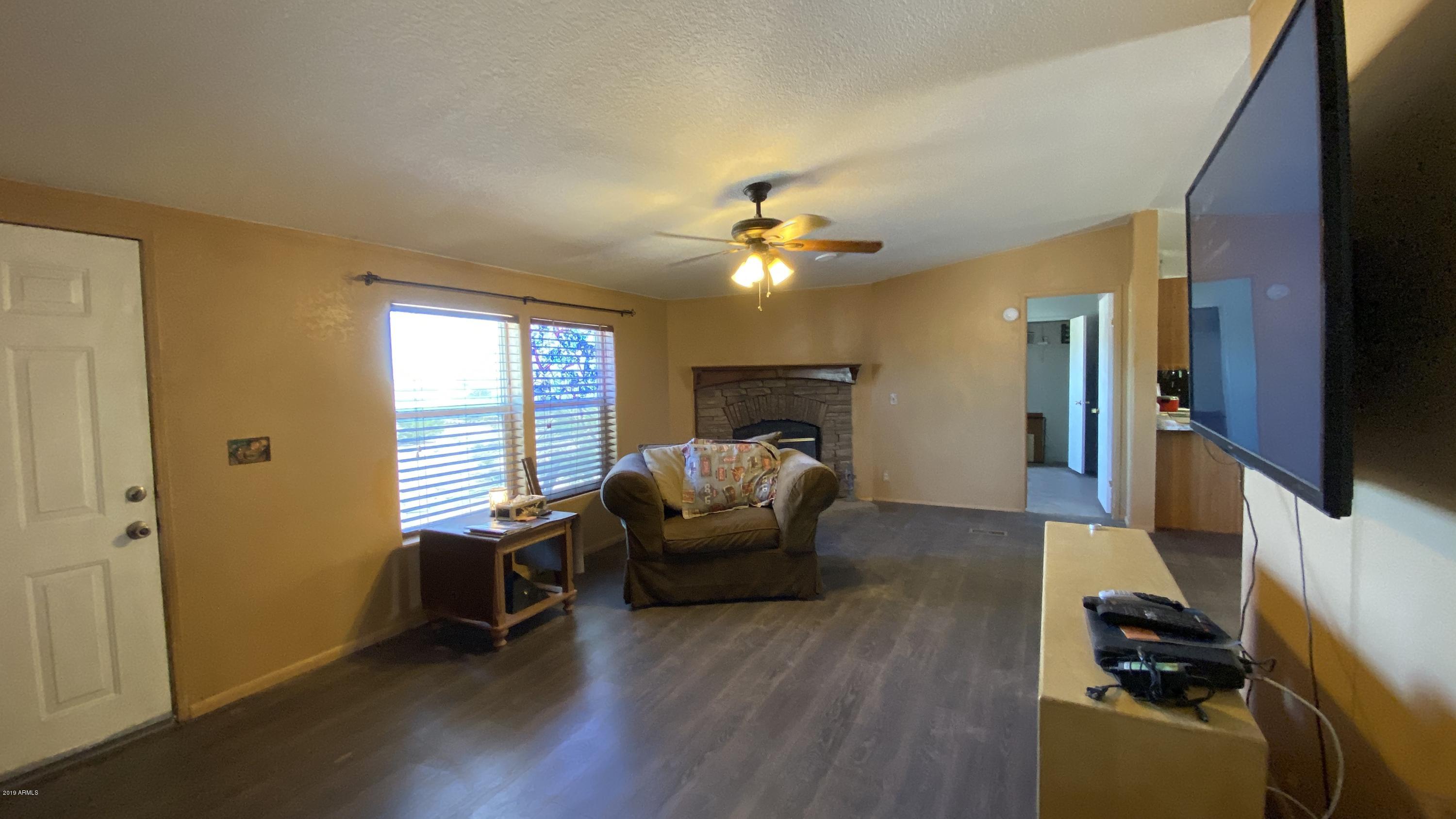 17494 North Stonebluff Road Maricopa, AZ 85139 - Photo 6 of 42 5_Living Room