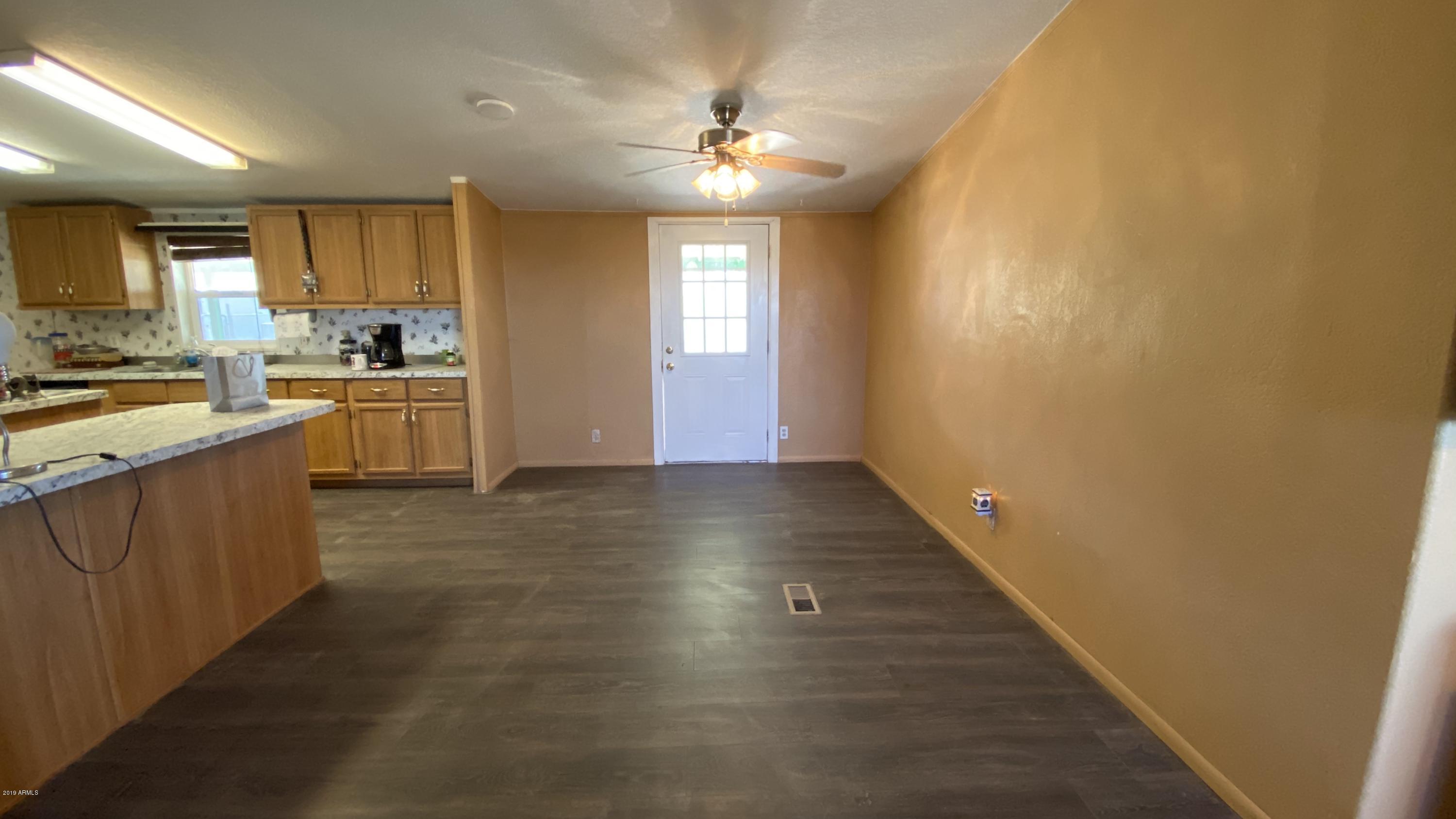 17494 North Stonebluff Road Maricopa, AZ 85139 - Photo 7 of 42 6_Living to Dining