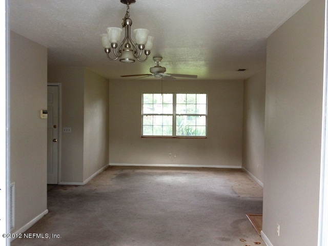 439 Irex Road Atlantic Beach, FL 32233 - Photo 3 of 12 a view of a chandelier in a room