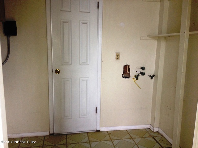 439 Irex Road Atlantic Beach, FL 32233 - Photo 9 of 12 a bathroom with a shower