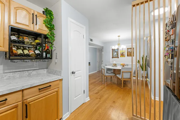a view of a kitchen and dining room