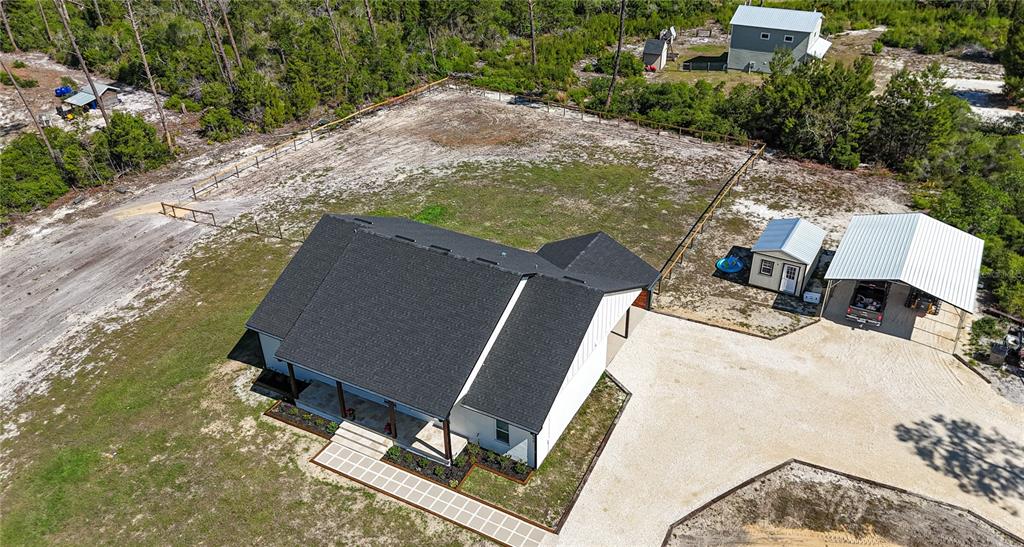 7890 Southwest 129th Avenue Cedar Key, FL 32625 - Photo 40 of 45 a view of backyard with tub