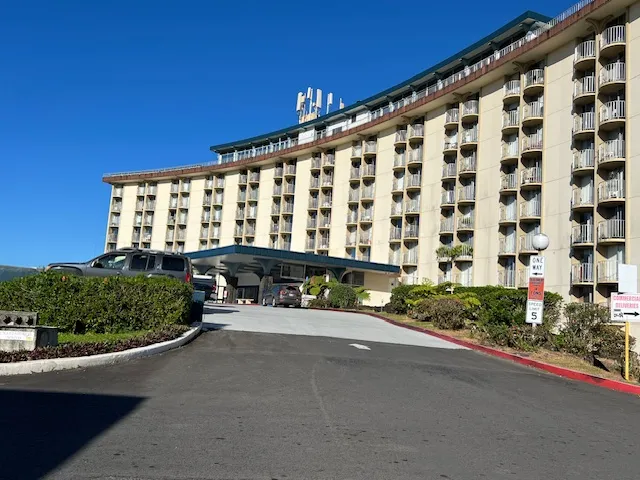 a view of a building with a street