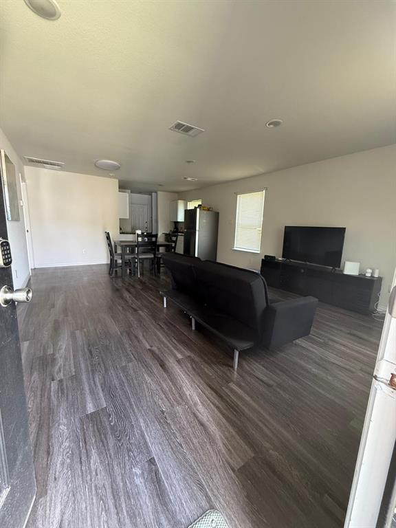 2614 Hooper Street Dallas, TX 75215 - Photo 6 of 13 a living room with furniture and a wooden floor